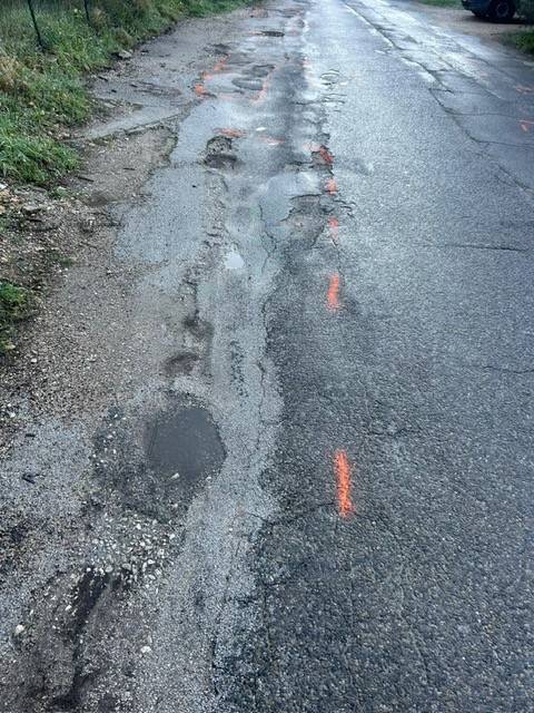 Signaler une dégradation sur la route 