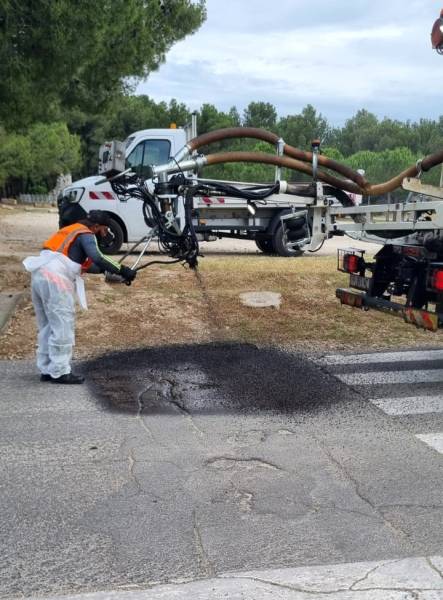 Réparation bords de chaussée à l'enrobeur projeteur