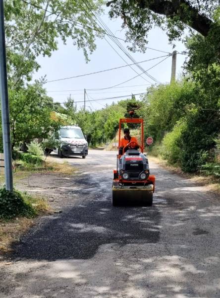 compactage du nid de poule avec un cylindre via patch