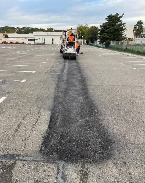 Réparation de parking avec nids de poule  à Marseille